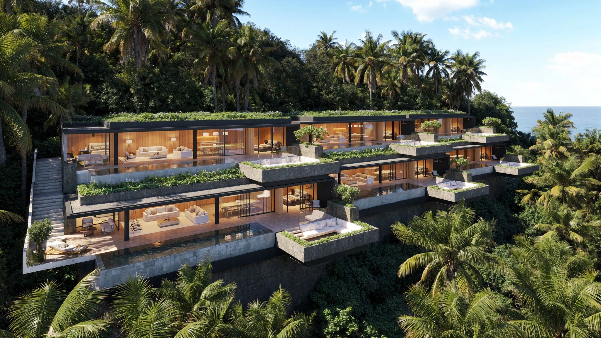 MAYAH hotels and branded residences with planted terraces amid tropical palms overlooking the sea